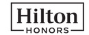 Hilton Honors brand logo for reviews of travel and holiday experiences