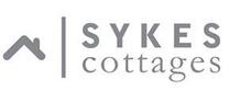 Sykes Cottages brand logo for reviews of travel and holiday experiences